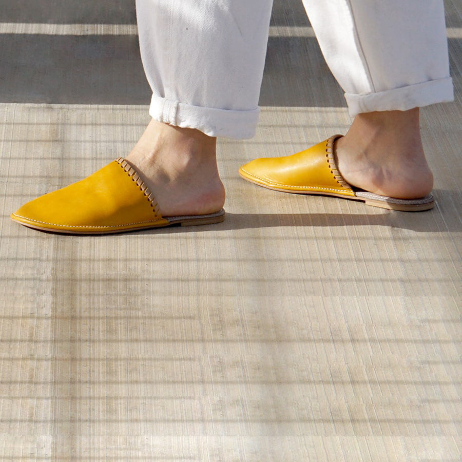 mustard leather Unisex slipper designed by rana cheikha