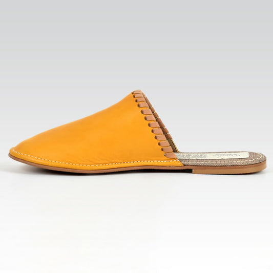 mustard leather Unisex slipper designed by rana cheikha