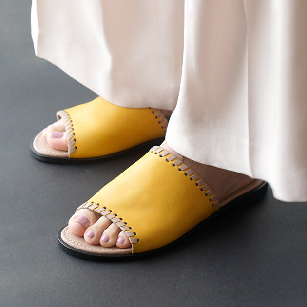 Yellow leather slipper
