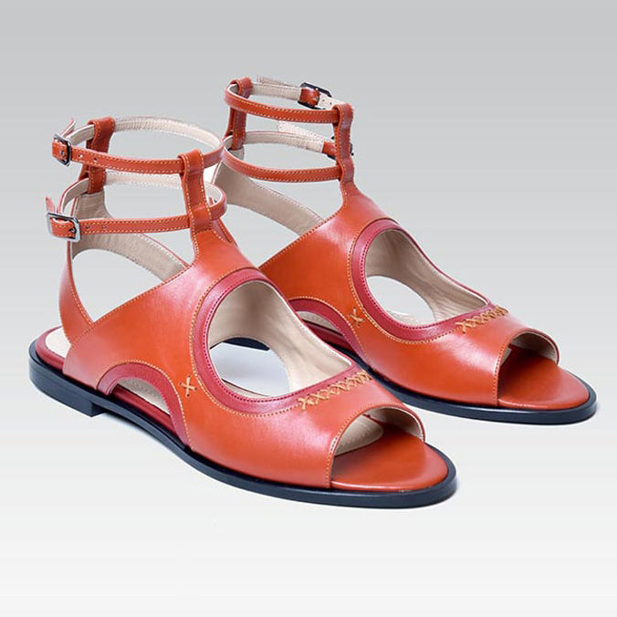 Women's Interlocking G cut-out slide sandal in orange leather | GUCCI® US