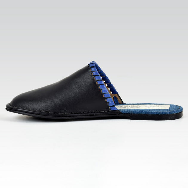 black leather Unisex slipper designed by rana cheikha