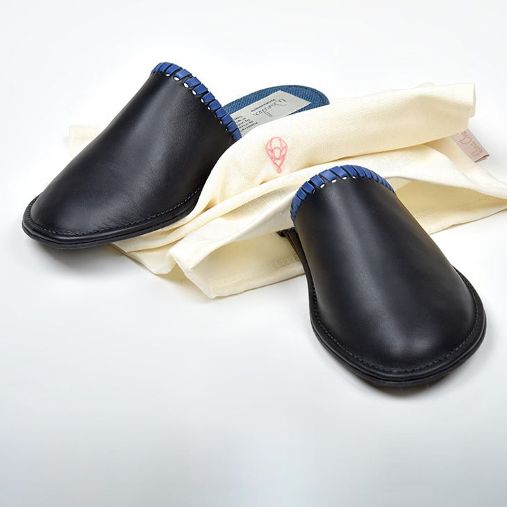 black leather Unisex slipper designed by rana cheikha