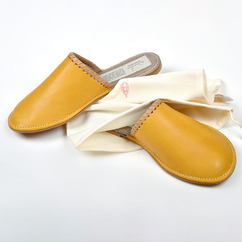 mustard leather Unisex slipper designed by rana cheikha